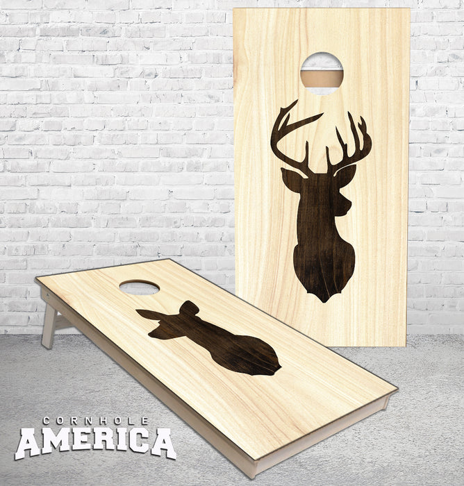 Whitetail Buck Deer and Doe Silhouette dark stained on light wood cornhole boards