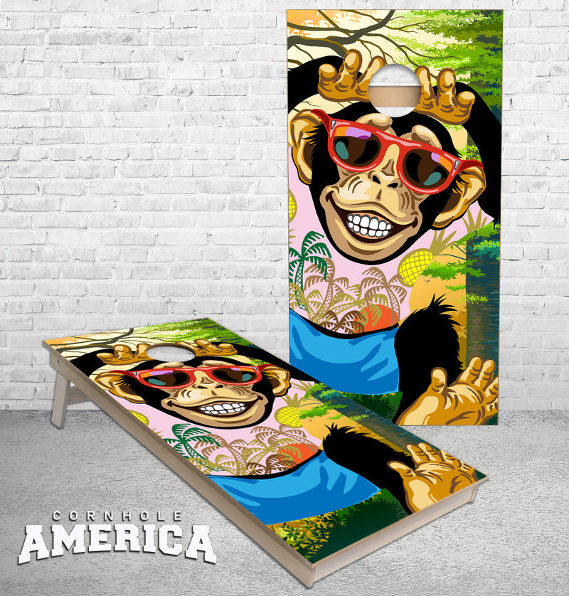 Funky Monkey with Glasses hanging from hole cornhole boards