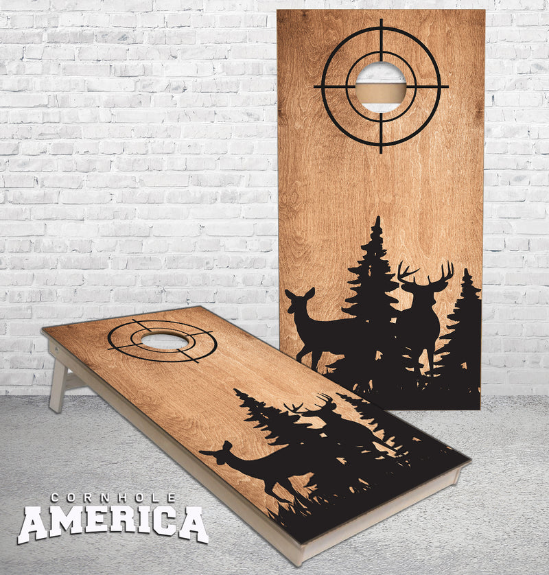 Doe and Buck silhouette on medium brown cornhole boards