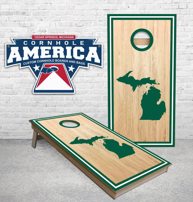 Michigan on Stained with Black Outer striped boarder and Hole Cornhole boards